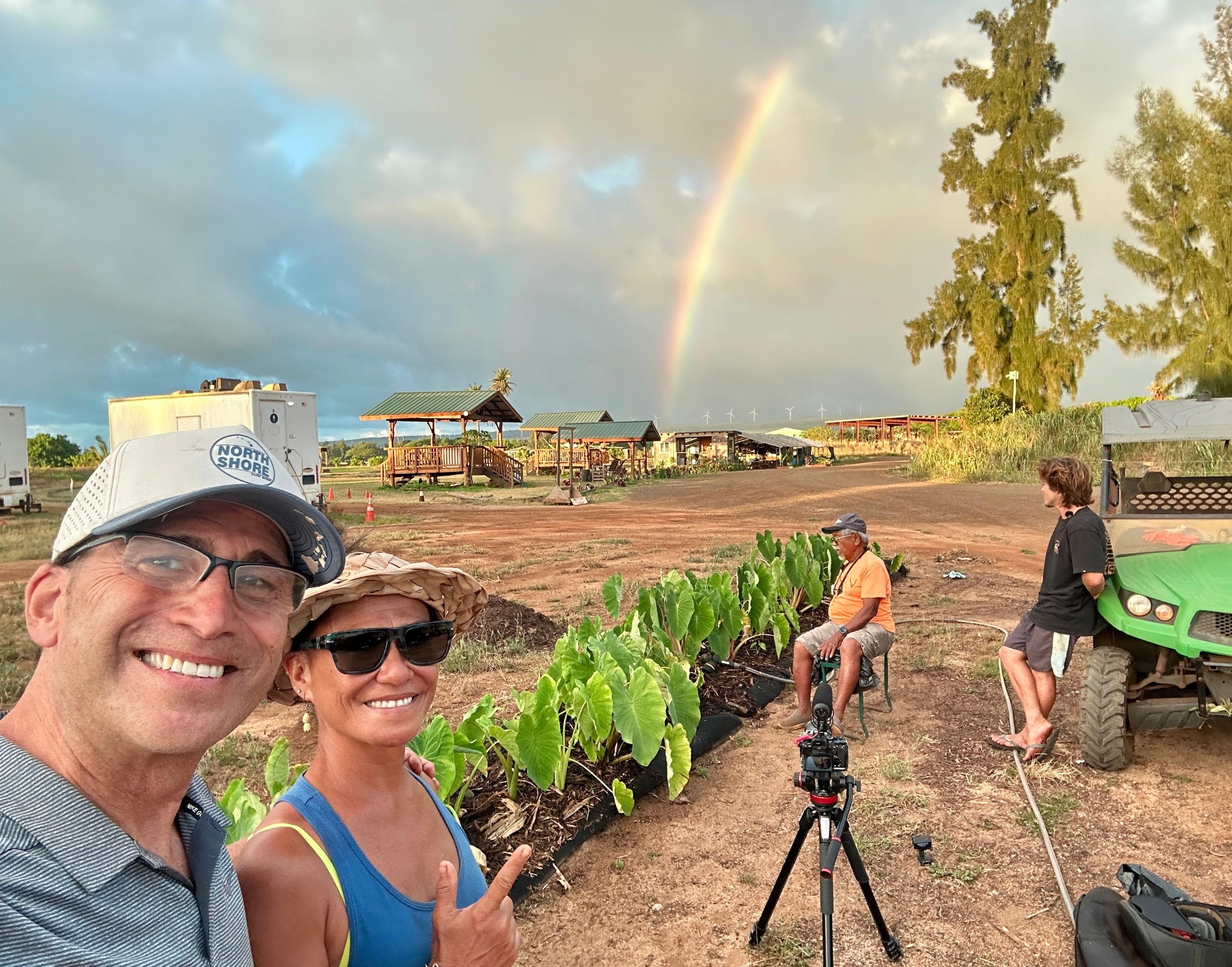 Rainbow on set, taro rows behind